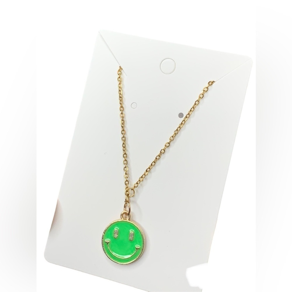 Gold and green smiley face